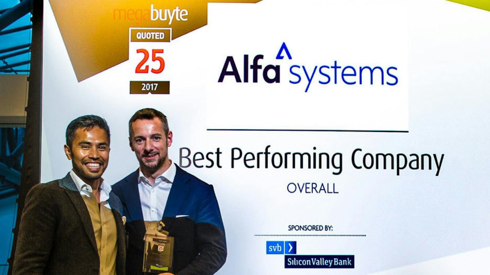 Alfa CEO Andrew Denton collecting the award for Best Performing Company overall