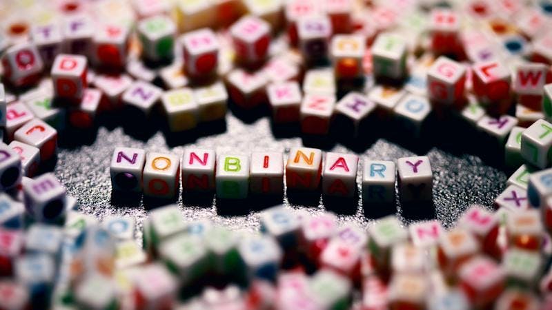 Colourful letter cubes that spell out non-binary